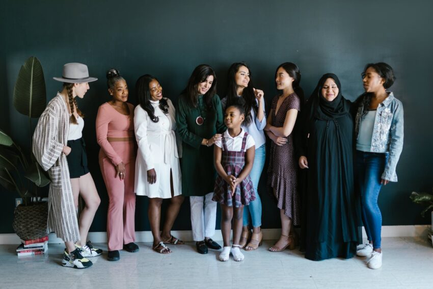 group of women standing close to each other